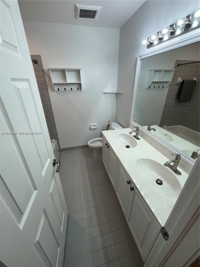 Building Photo - 8965 SW 59th Ct