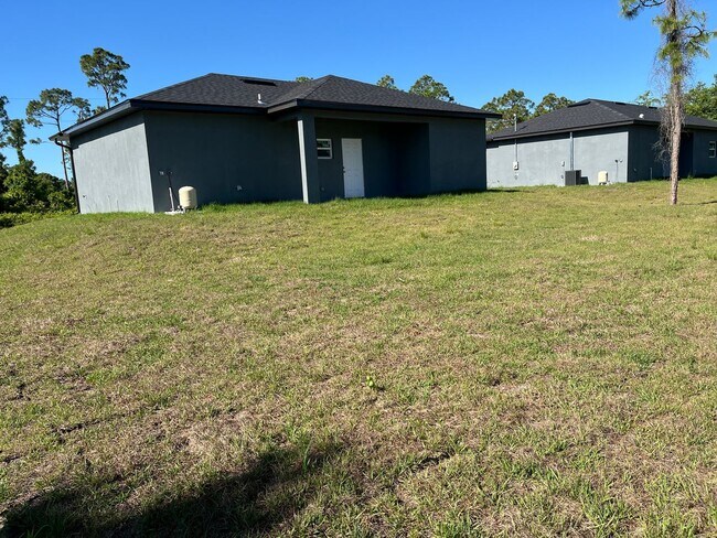 Building Photo - Brand New Home-GREAT LOCATION LEHIGH ACRES