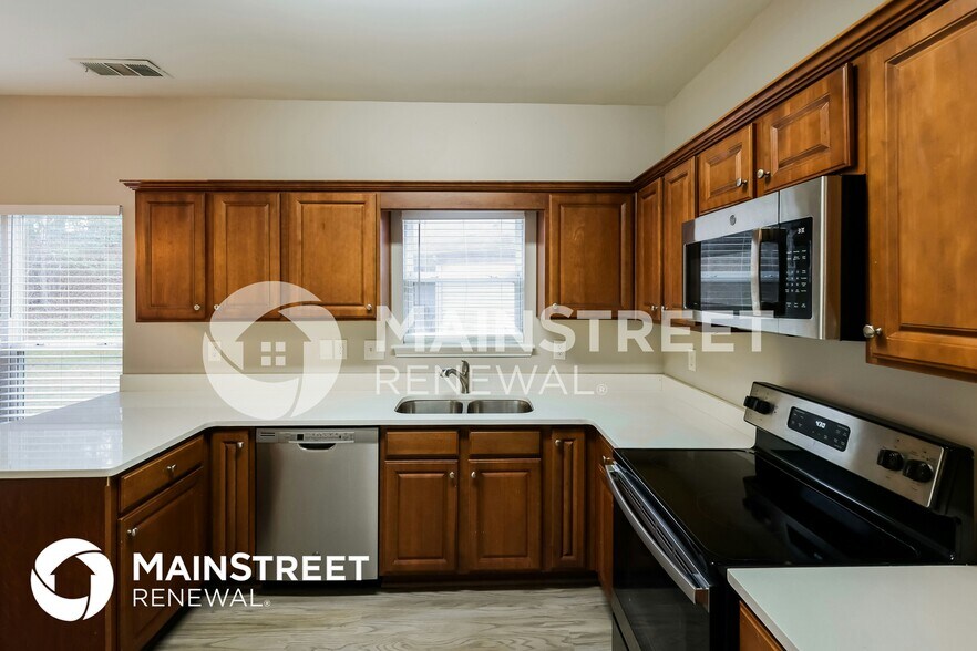 Building Photo - 12879 Woodland Park Cir