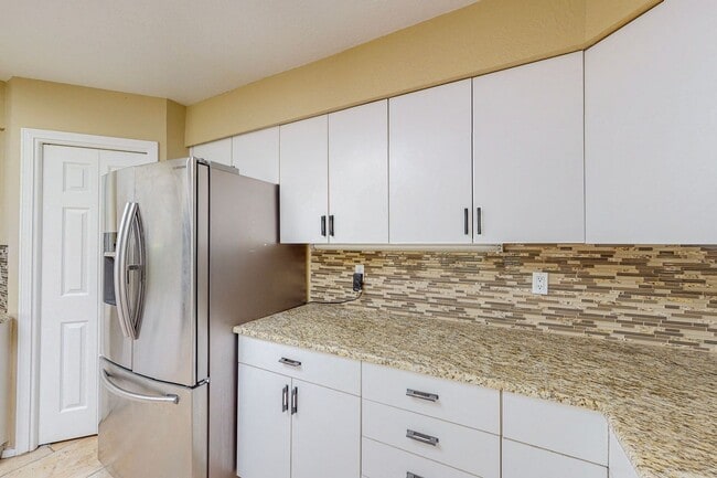 Building Photo - ACADEMY RIDGE 2 Bedroom Plus Office   2 Ba...