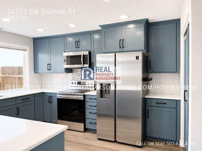 Building Photo - 14373 SW Daphne St