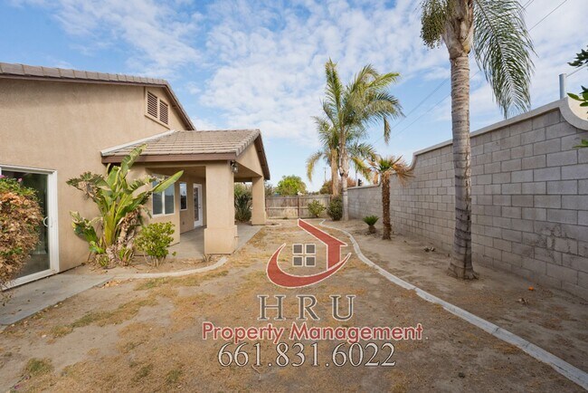 Building Photo - SW-Bakersfield  features 4 bed 2 bath with solar panels