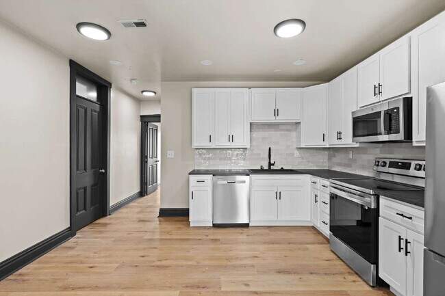 Building Photo - For Rent: Renovated 2-Story Townhouse in M...