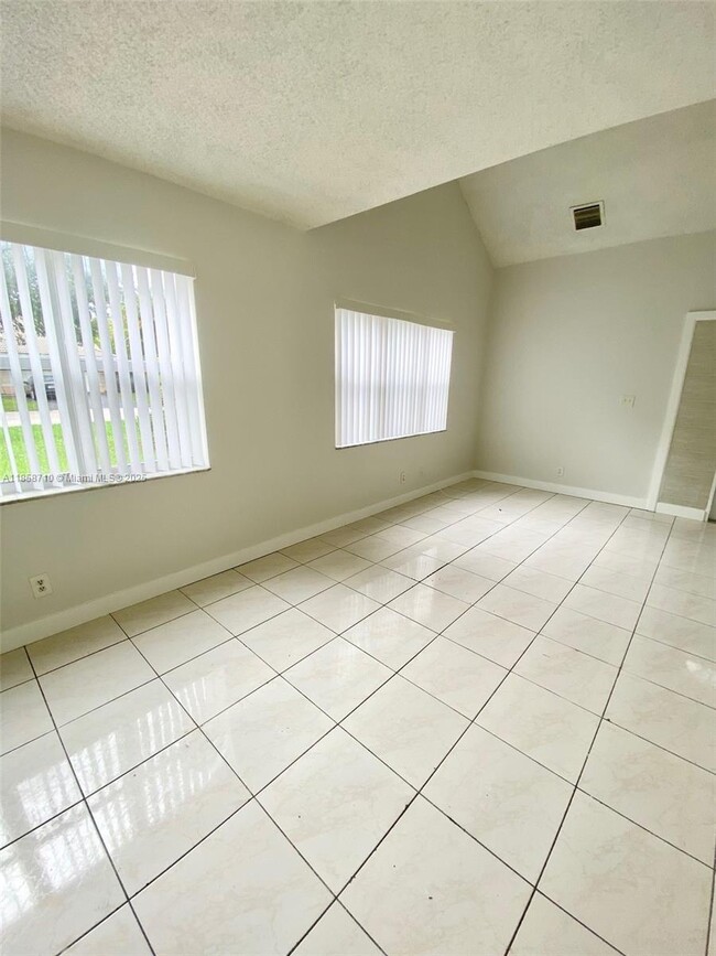 Building Photo - 3200 Coral Springs Dr
