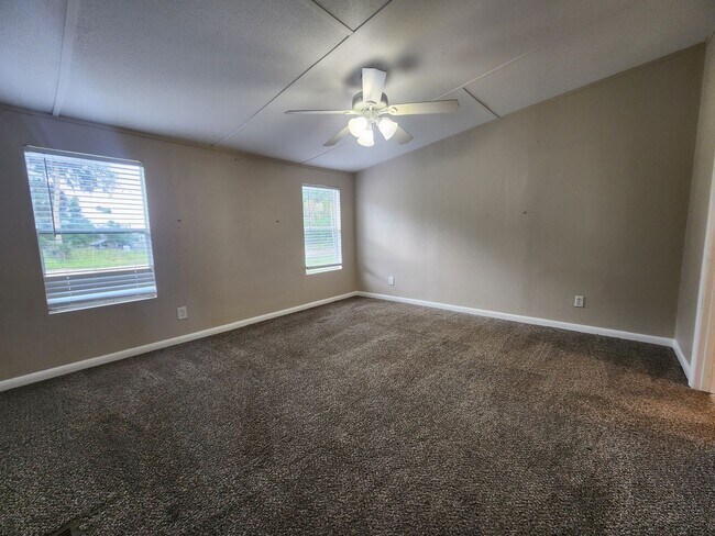 Building Photo - 3 bed, 2 bath w/ Front & Back Decks, 1/4 Acre of land, FENCED backyard