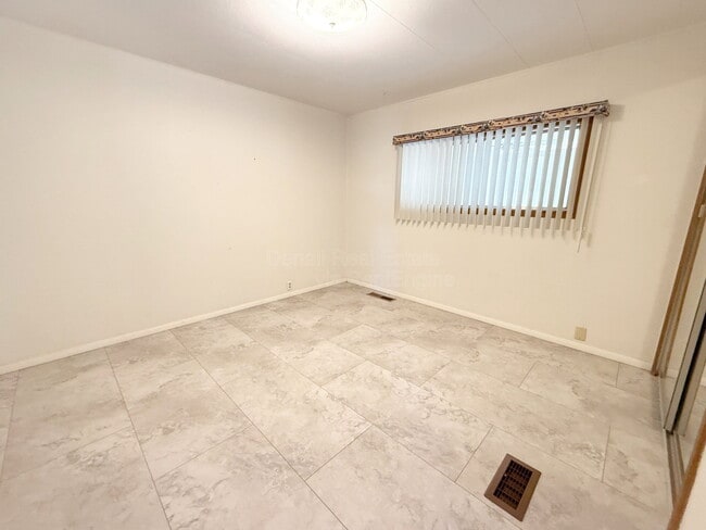 Building Photo - 10675 N Kilimanjaro Ave