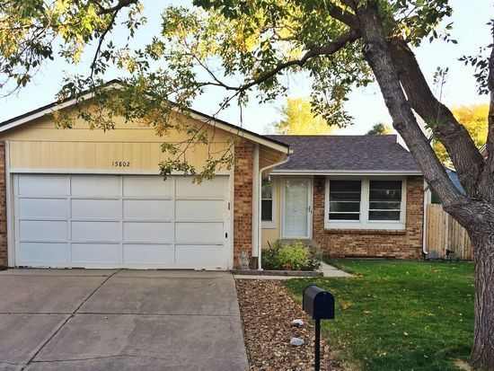 Building Photo - "Spacious 4-Bedroom Aurora Gem with Cozy Fireplace and 3 Full Baths!"