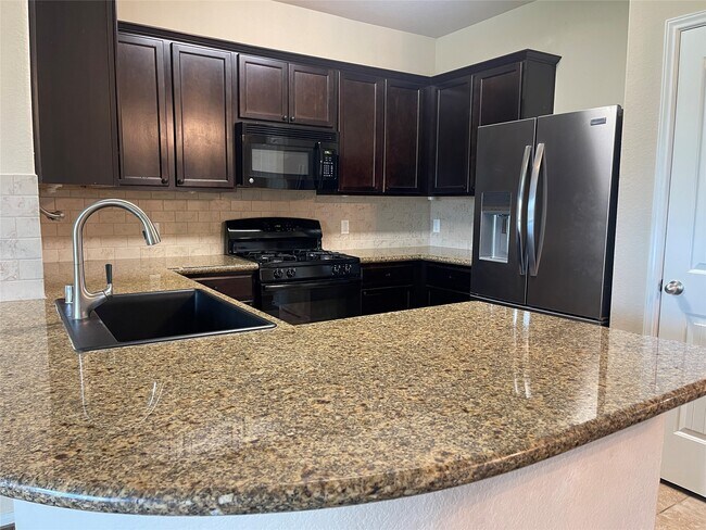 Building Photo - 9203 Adobe Sky Ct