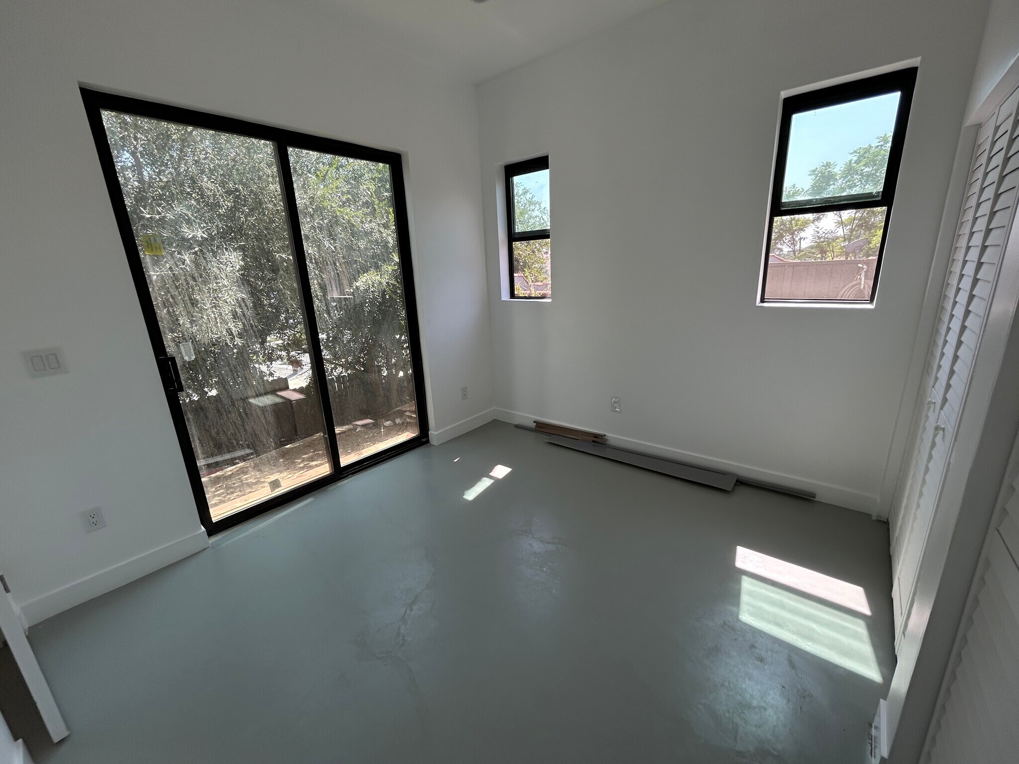 Sliding doors in the bedroom that leads to patio. - 4435 Radium Dr