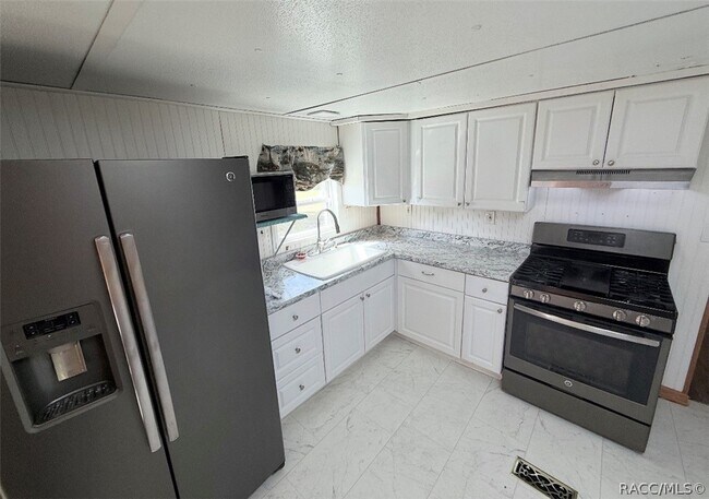 Building Photo - 6563 W Cyrus St