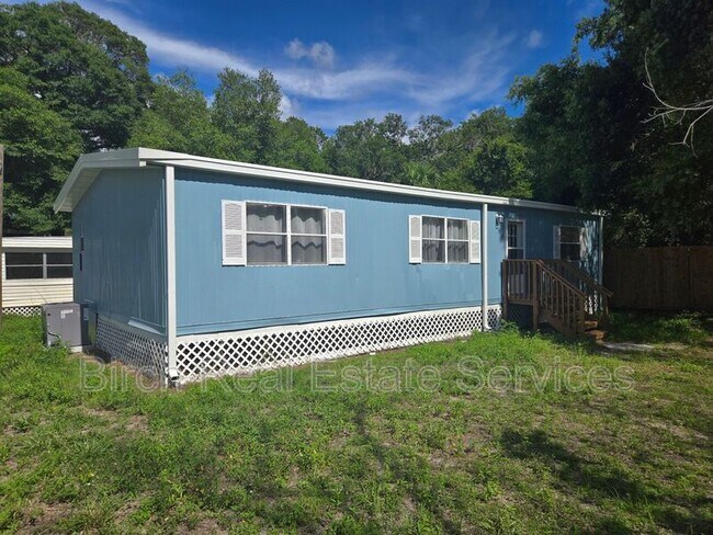 Building Photo - 8628 Adonis Rd
