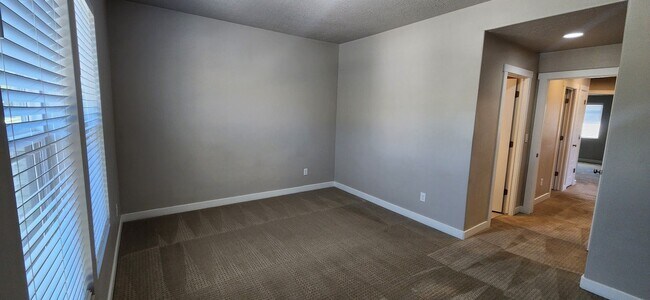 Building Photo - $2,000 OFF 4-bed, 3.5-bath Townhome Available Now!