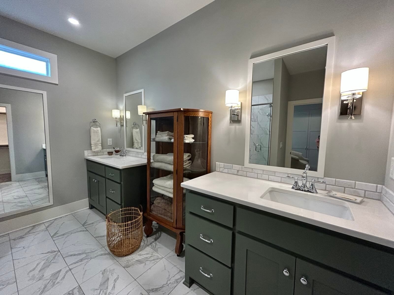 Primary bedroom with ensuite bathroom and separate his and her closets - 405 E 32nd Ave