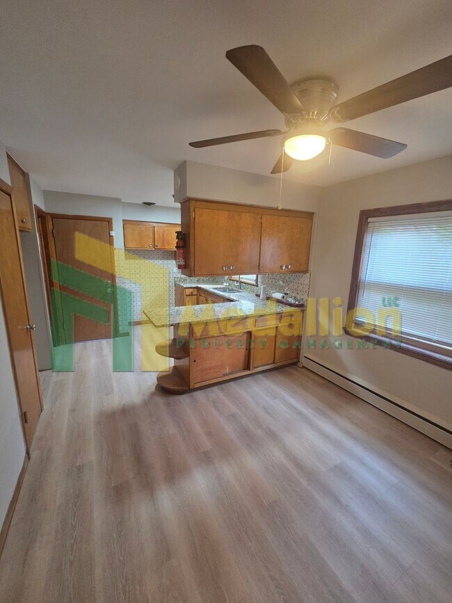 Building Photo - Spacious 6-Bedroom Home with Finished Basement and Backyard