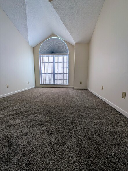 Master bedroom with walk-in closet and private half bathroom - 1501 Green Acres Blvd