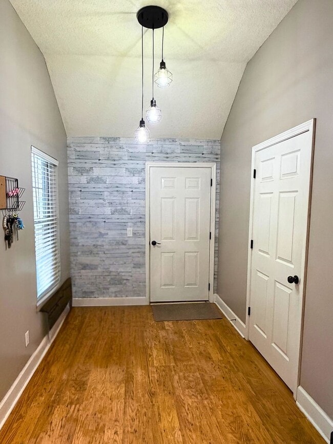 Building Photo - 4/2 with a LARGE fenced in yard!