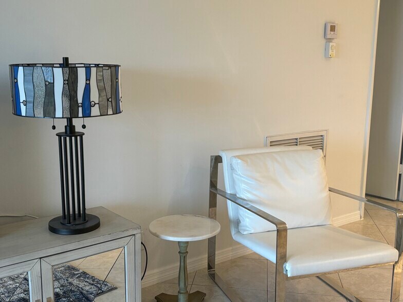 Living room with ample seating for guests. - 6000 N Ocean Blvd