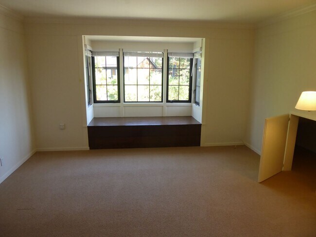 Building Photo - SPACIOUS FOUR BEDROOM / THREE AND HALF BAT...