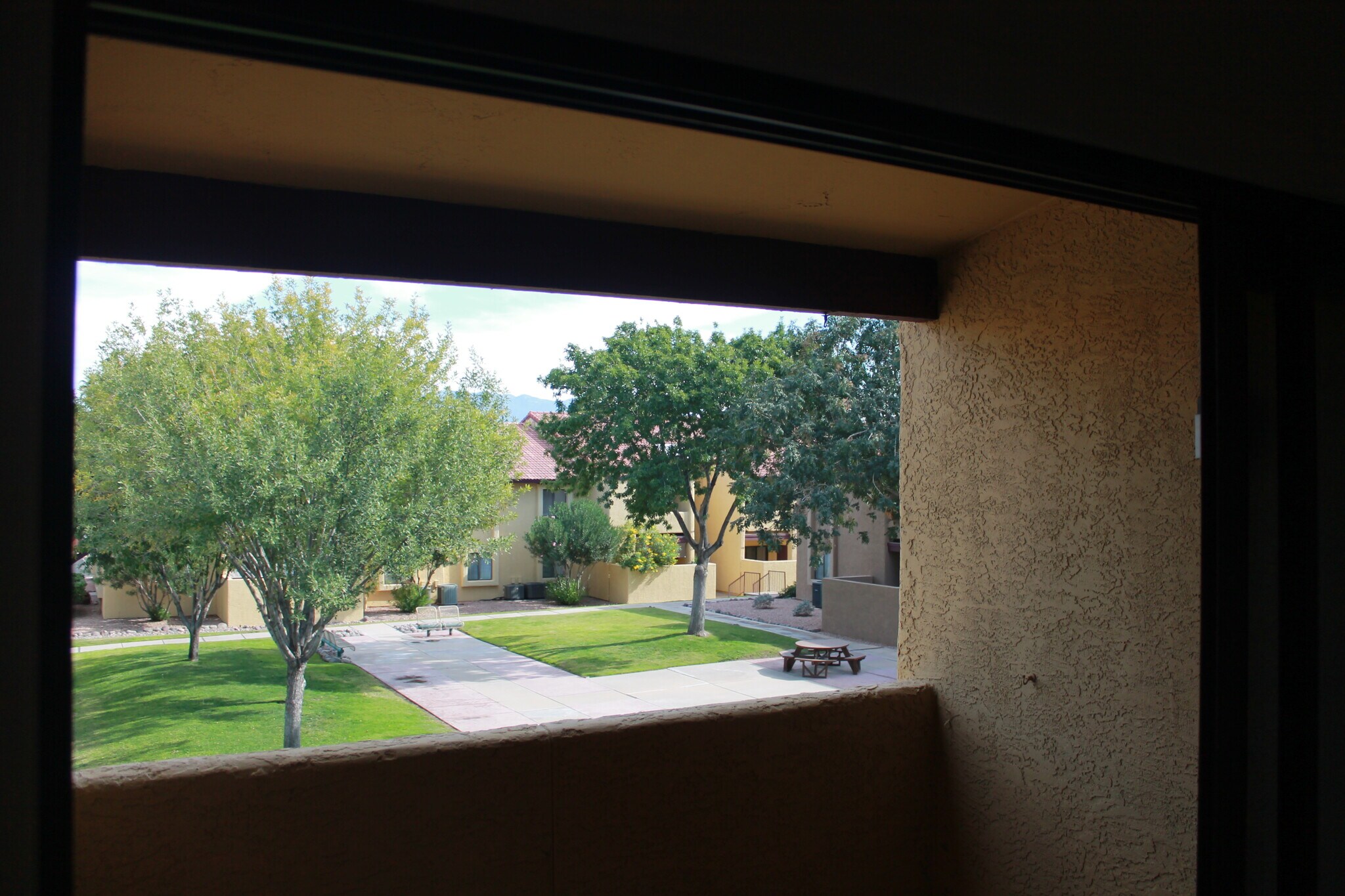 Covered porch + view of green space - 2188 N Pantano Rd
