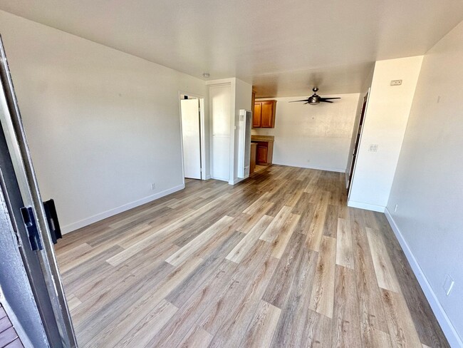 Building Photo - End unit condo with garage and additional ...