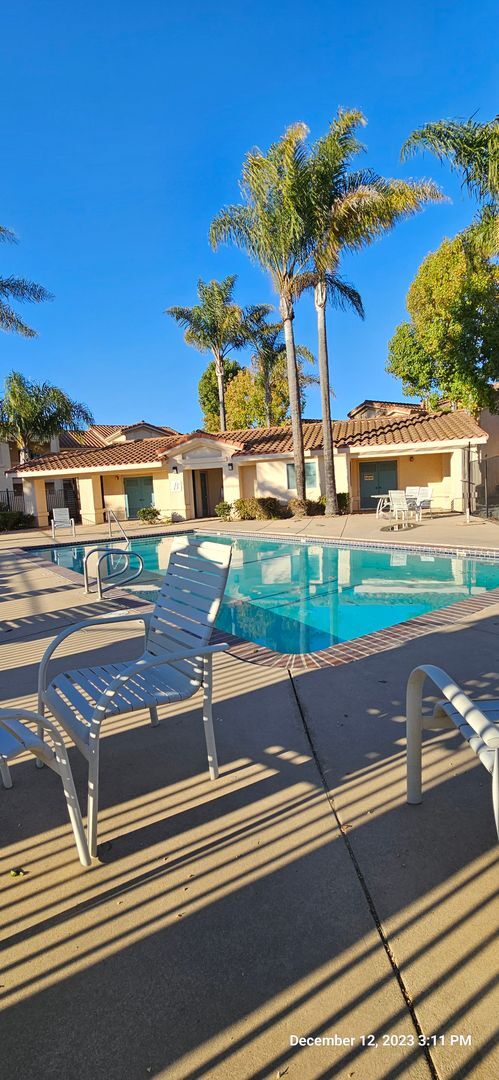 Building Photo - Downstairs Corner Condo in the Gated Community of Las Palmas