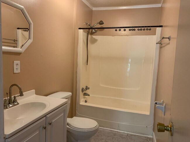 Building Photo - A quaint three bedroom one bath single family house in Five Points