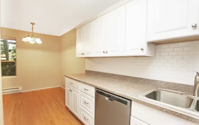 Building Photo - Serene Park-Like Sanctuary | Large Updated Townhome with Wooded Views, 3 bathrooms and 2 large be...