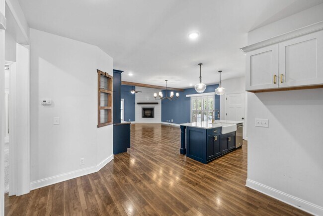 Building Photo - Elegant 4-Bedroom Home with Vaulted Ceilin...