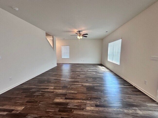 Building Photo - efficient two-level home provides a large living room, 4 very spacious bedrooms, and 2.5 bathrooms