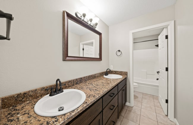 Building Photo - Modern 4BR Corner Lot Home with A/C, Office, Chef’s Kitchen & Private Fenced Yard