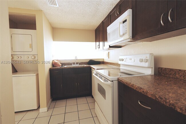 Building Photo - 9915 W Okeechobee Rd