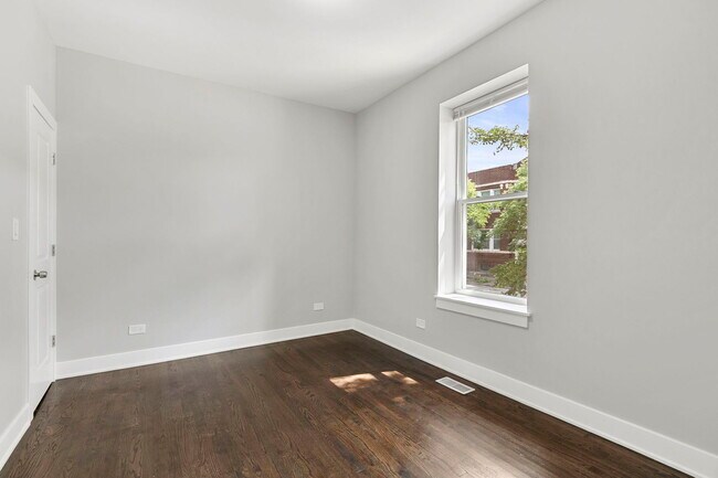 Building Photo - 7359 S Emerald Ave