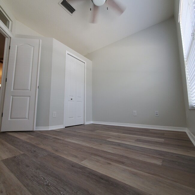 lower level bedroom closet - 5808 Fishhawk Ridge Dr