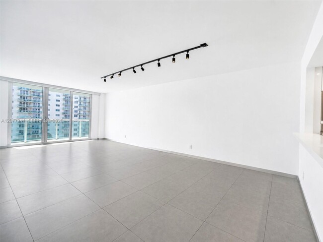 Building Photo - 19380 Collins Ave