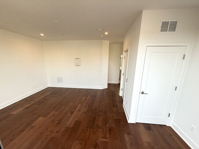 Building Photo - Brand new 4 level, 4 Bedroom Townhome with Elevator!