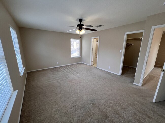 Building Photo - Generous Outdoor Space & Lawn Care Included!