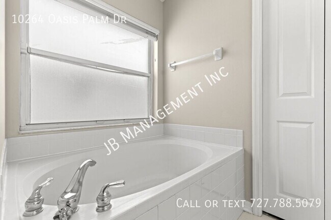 Building Photo - 10264 Oasis Palm Dr