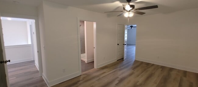 Building Photo - 5-bedroom home with 3 car garage and fully...