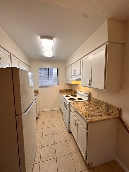 Building Photo - 9277 W 56th Pl