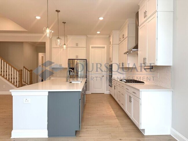 Building Photo - Elegant 4-Bed / 3.5-Bath Home with Main-Level Primary Suite, Quartz Kitchen & 3-Car Garage – In H...