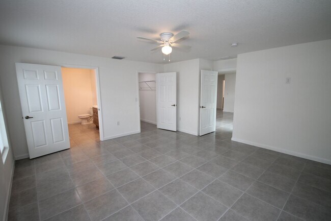 Building Photo - Stunning 4BR/2BA Palm Bay Retreat with Modern Upgrades & Oversized Lot!!