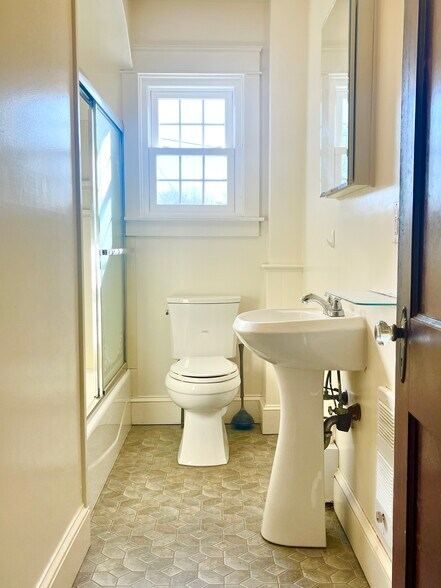 Bathroom with a tub/shower combo - 52 Old Fort Rd