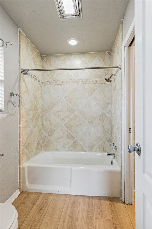 Building Photo - 7522 NW Stonegate- COMING SOON!