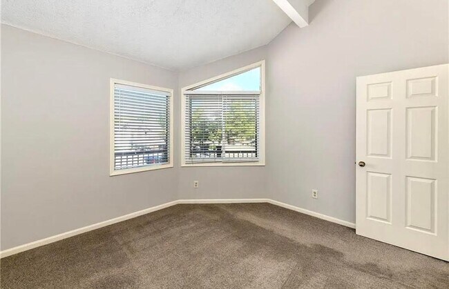 Building Photo - COMING SOON: Charming 2-Bedroom Condo in a...