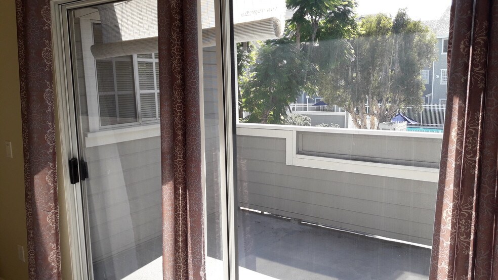 large balcony overlooking pool - 3500 S Greenville St