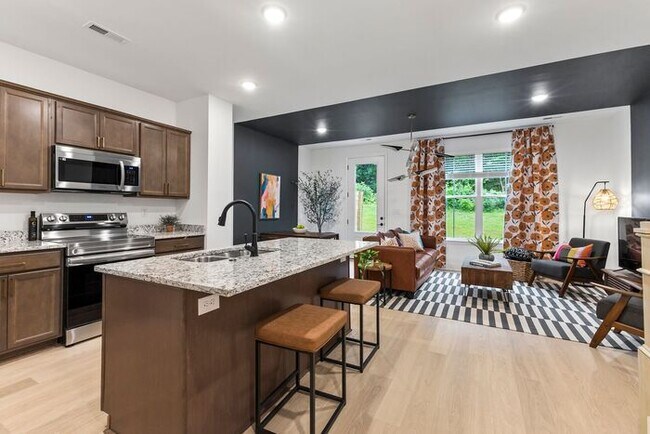 Building Photo - Modern 3-Bed, 2.5-Bath Townhome Now Offering $1000