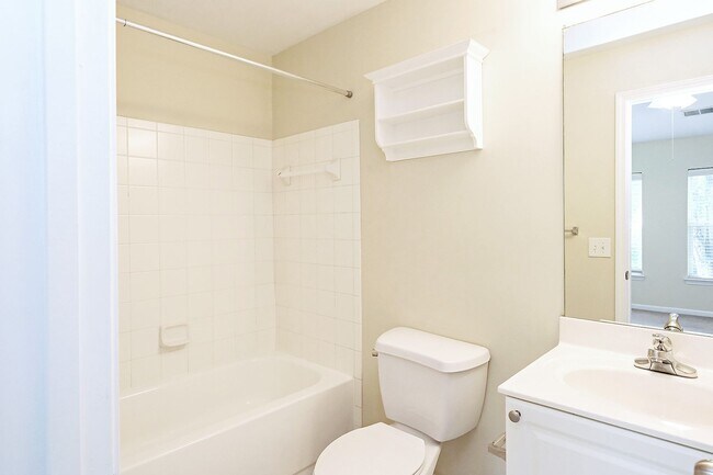 Building Photo - Student + Pet-Friendly Woodlands Condo with Community Amenities