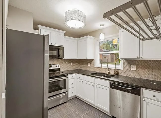 Building Photo - This Prairie Village Ranch is Ready for You!