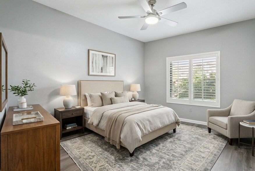 Spacious primary bedroom is light and bright (virtually staged) - 14000 N 94th St