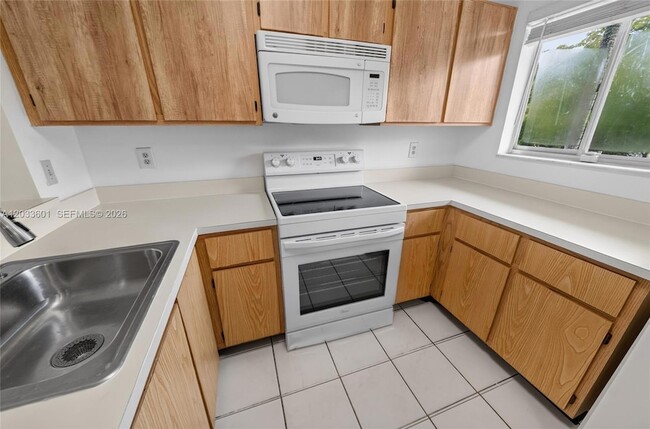 Building Photo - 8750 N Sherman Cir